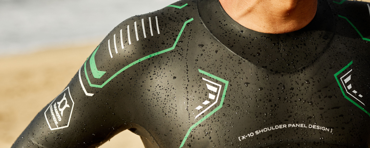 man wearing the vision wetsuit, close up of the collar