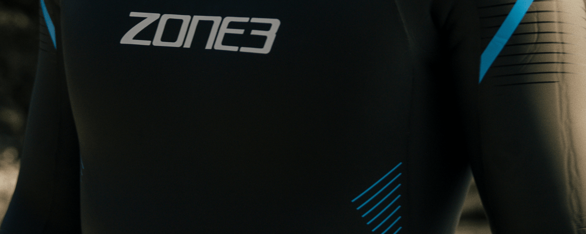 Close-up of a Zone3 wetsuit with branding.